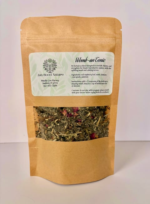 Kraft pouch of Womb-an Tonic herbal tea blend by Root Naturals, displaying mixed dried herbs and flowers through clear window